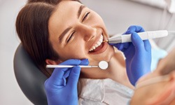 Woman smiling during dental checkup