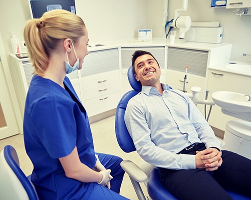 patient talking to his dentist about tooth extractions in Idaho Falls