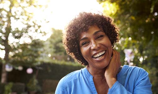 woman smiling outside