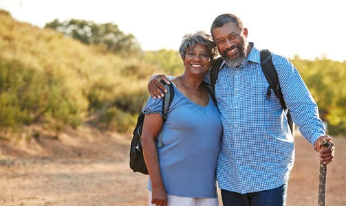 Couple smiling on hike