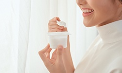 person eating yogurt