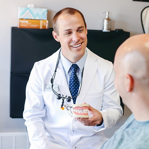 Dentist discussing dental implants in Idaho Falls with a patient