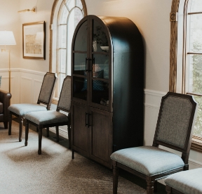 Row of blue leather dental treatment chairs