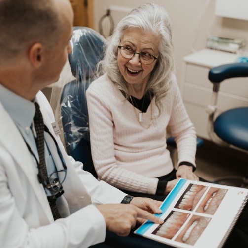 Dentist discussing dental insurance in Idaho Falls with patient