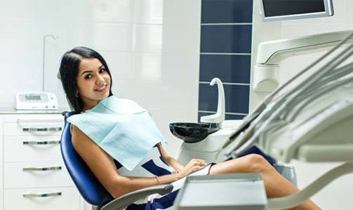 Woman in dental chair excited about sedation dentistry in Idaho falls